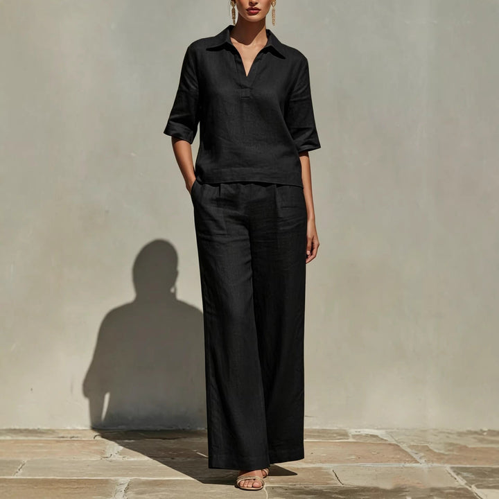 Matching women's relaxed fit collared top & wide-leg pants two-piece set. Versatile casual summer fashion.