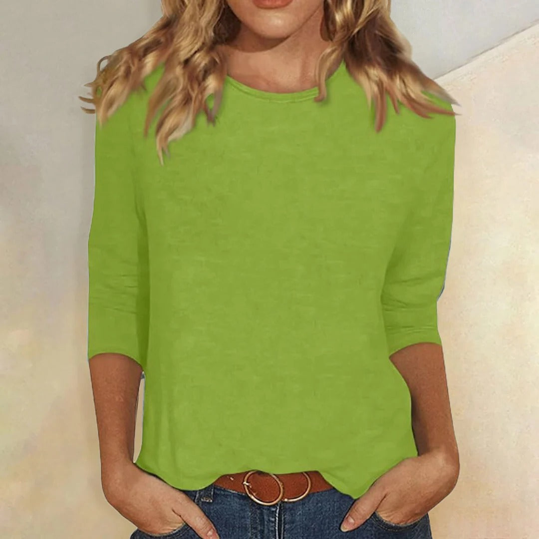 Soft solid women's 3/4 sleeve crew neck top, relaxed fit for ultimate comfort and casual everyday fashion.