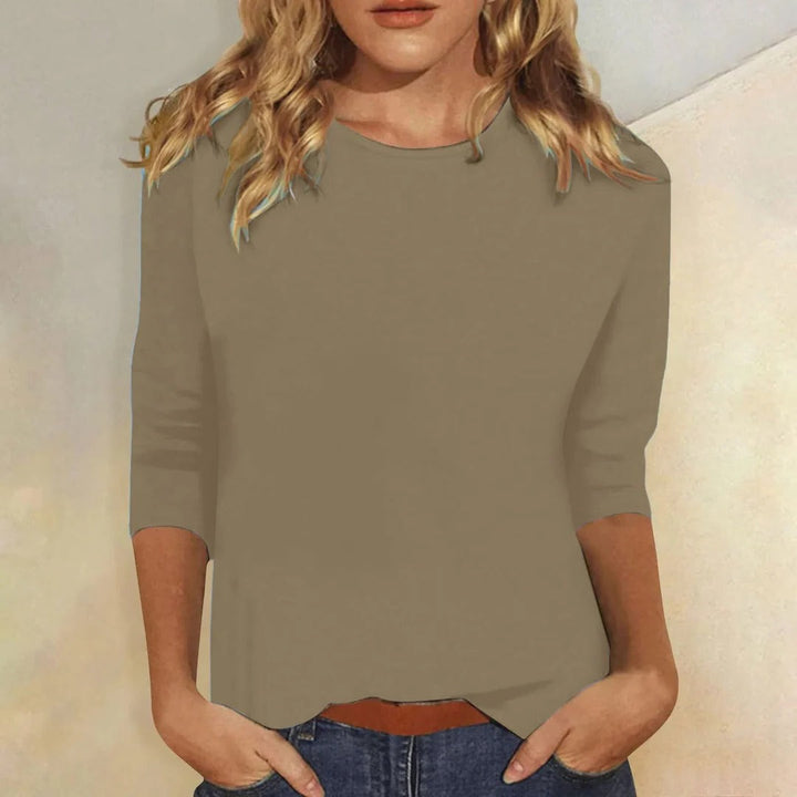 Versatile women's three quarter sleeve crew neck top, relaxed fit solid, ideal for summer & autumn fashion.