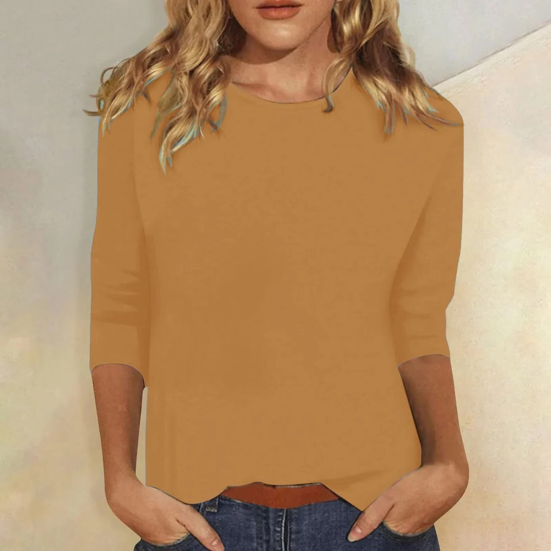 Women's casual 3/4 sleeve crew neck top, relaxed solid color for comfortable everyday summer fashion.