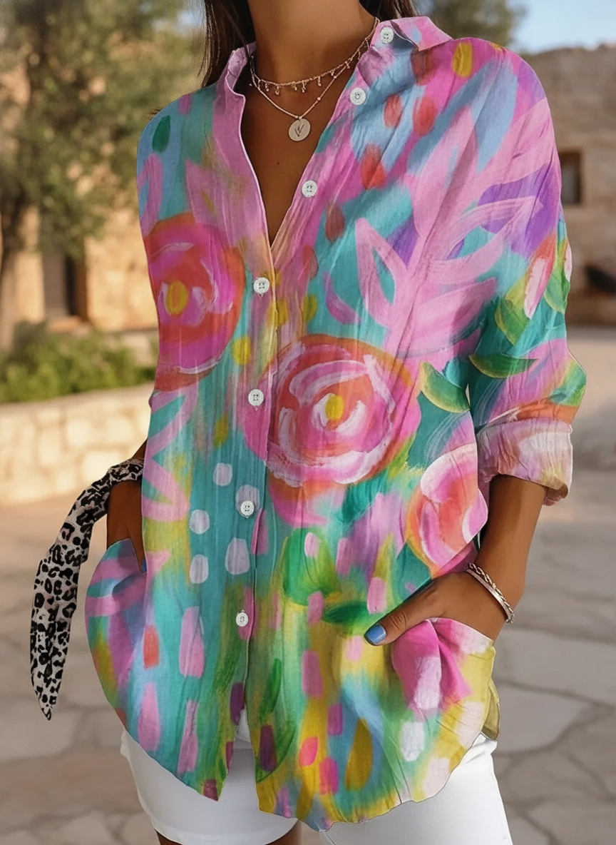 Women's relaxed fit abstract print blouse with vibrant colors, perfect for summer casual wear.