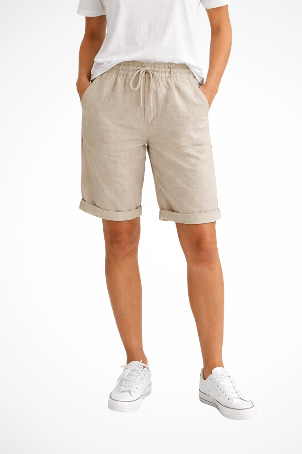 Women's relaxed fit beige capri pants with elastic waist, perfect for comfortable everyday casual wear.