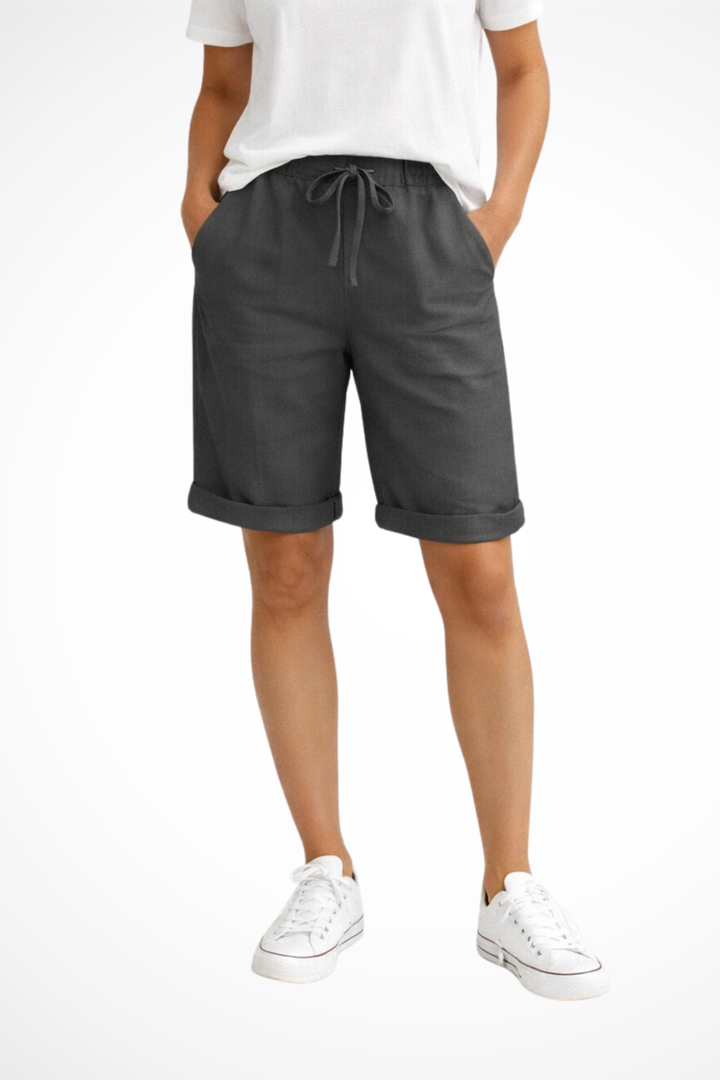 Green women's relaxed fit capri pants, perfect for comfortable warm-weather casual fashion.