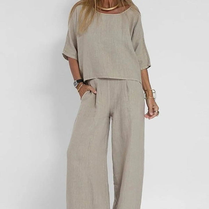 Women's relaxed-fit blouse & wide-leg trouser two-piece set, perfect for casual spring or summer style.
