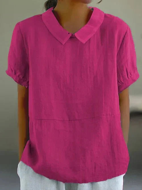 Women's relaxed-fit blouse with classic collar & short sleeves. Effortless chic for spring & summer.