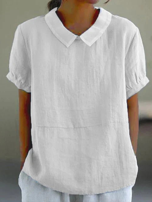 Chic women's collared blouse with a relaxed fit. Elegant short-sleeve top, great for versatile fashion.