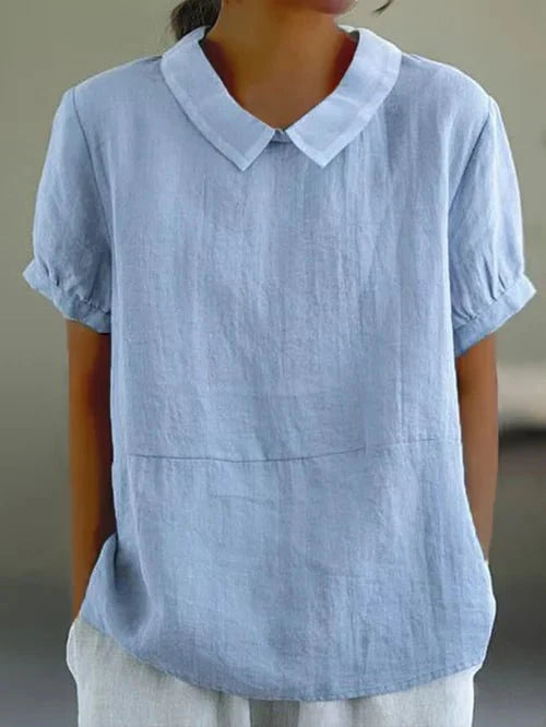 Women's relaxed-fit short-sleeve blouse. Classic collared top, comfortable & versatile for everyday wear.