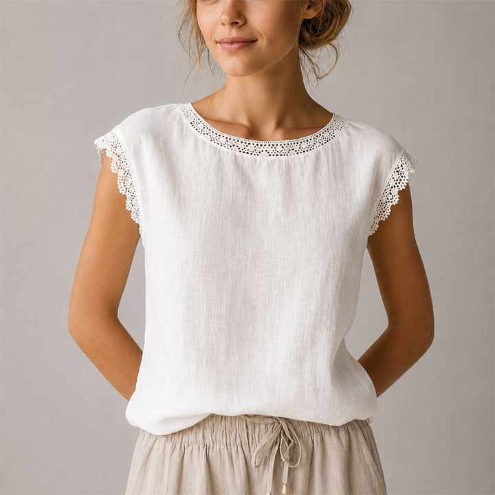 Elegant women's lace trim blouse, a comfortable relaxed fit top for all-season versatility.