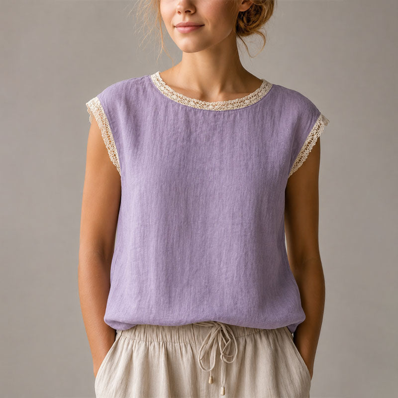 Casual women's relaxed fit blouse featuring pretty lace trim, ideal for comfort and style.