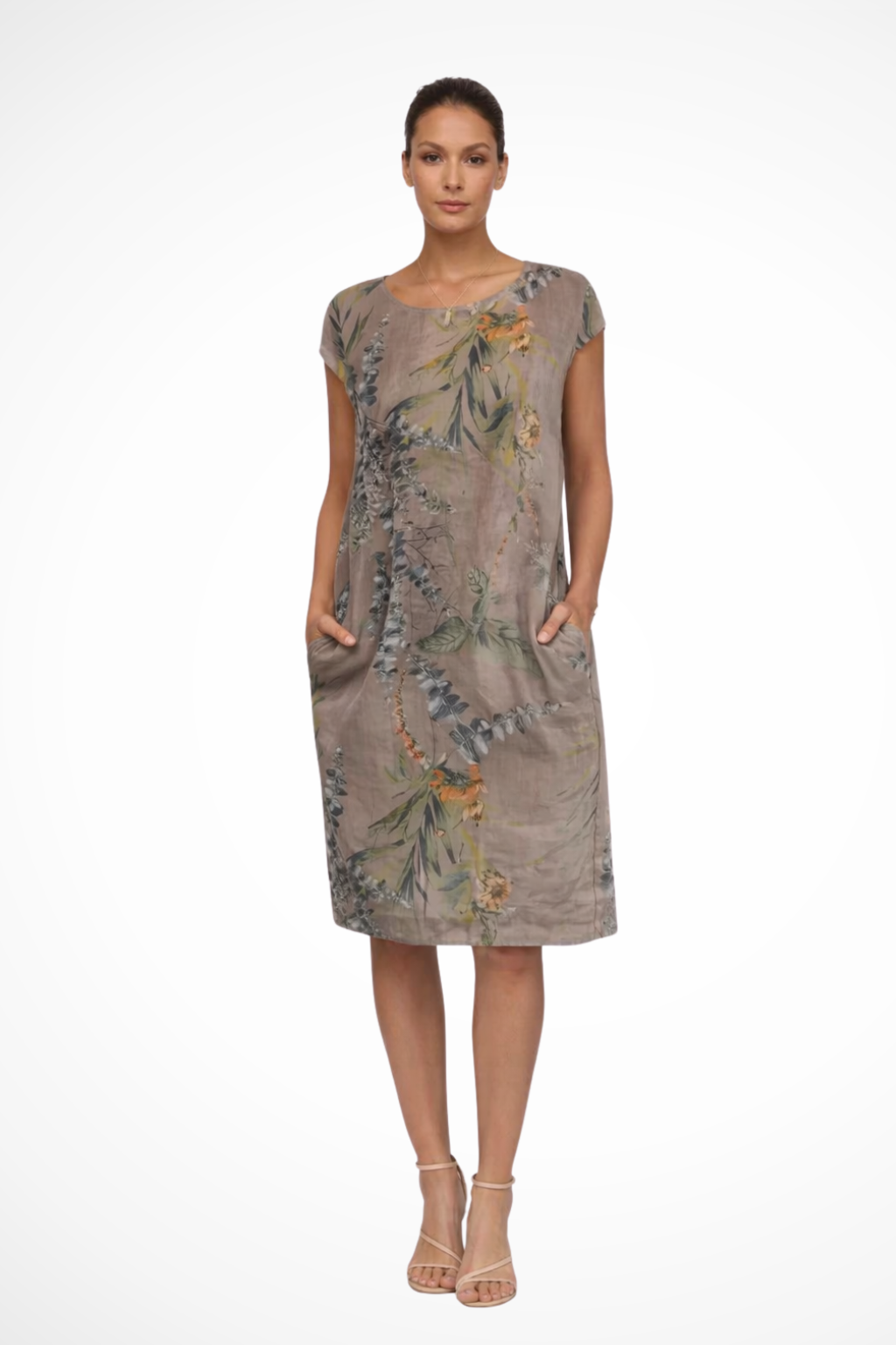 Casual women's day dress, relaxed fit with vibrant botanical print & convenient pockets.