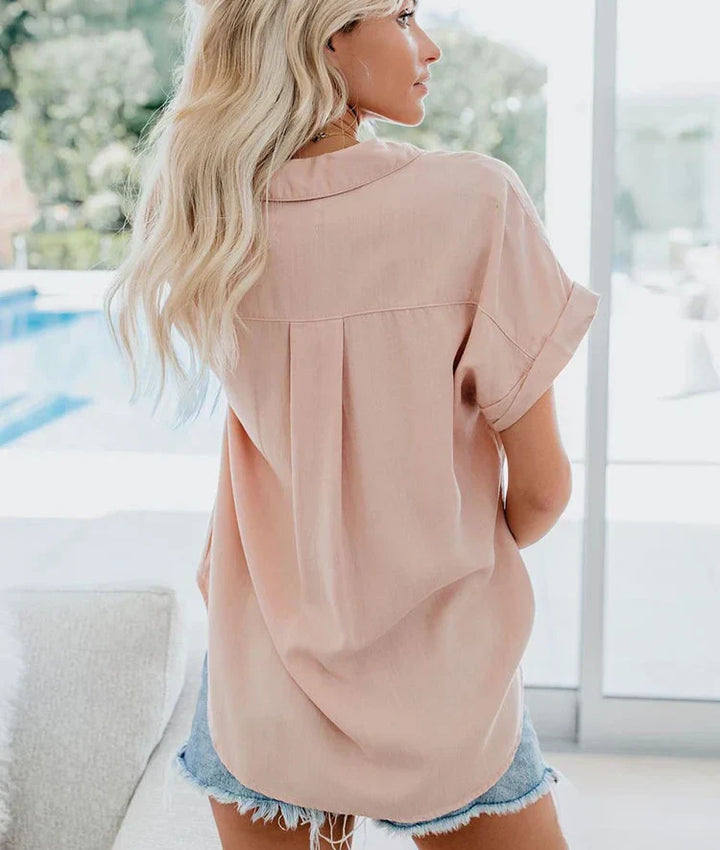 Comfortable women's relaxed fit long sleeve blouse with button front.