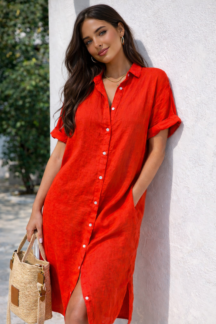 Women's relaxed fit button-front shirt dress, perfect for casual summer wear and vacation outfits. Midi length.