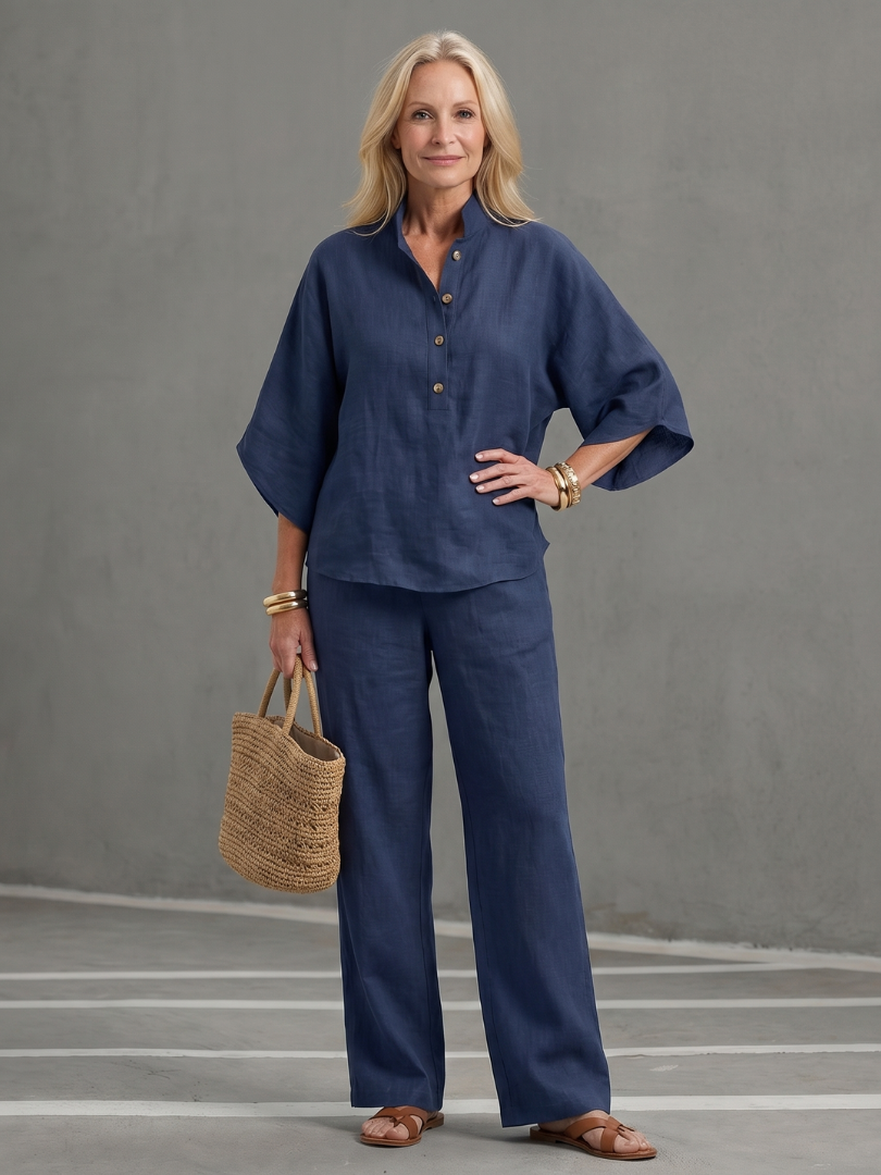 Stylish women's button front tunic set with straight leg trousers for a relaxed look.