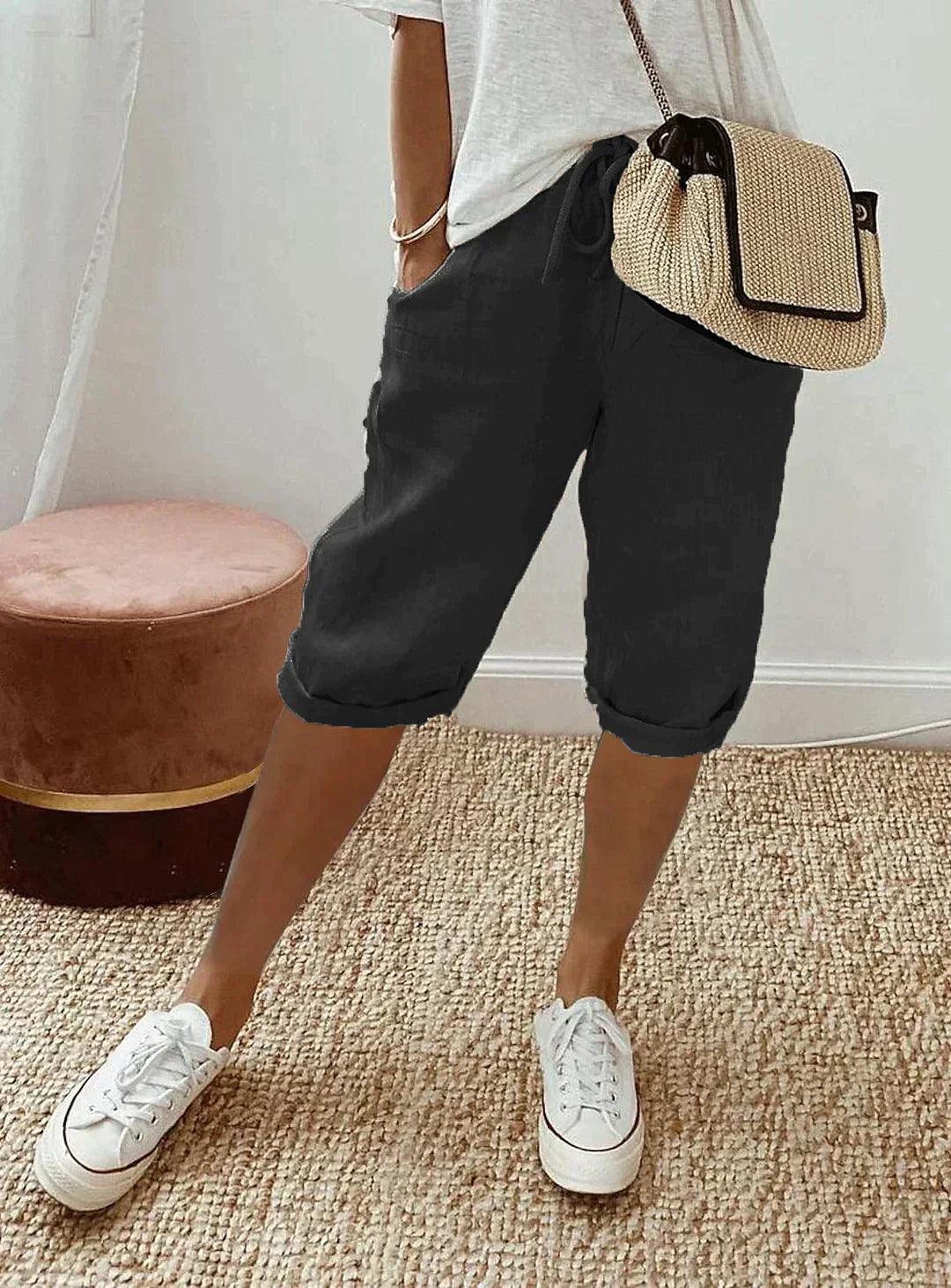 Lightweight women's capri pants with a loose, relaxed fit, offering ultimate summer comfort.
