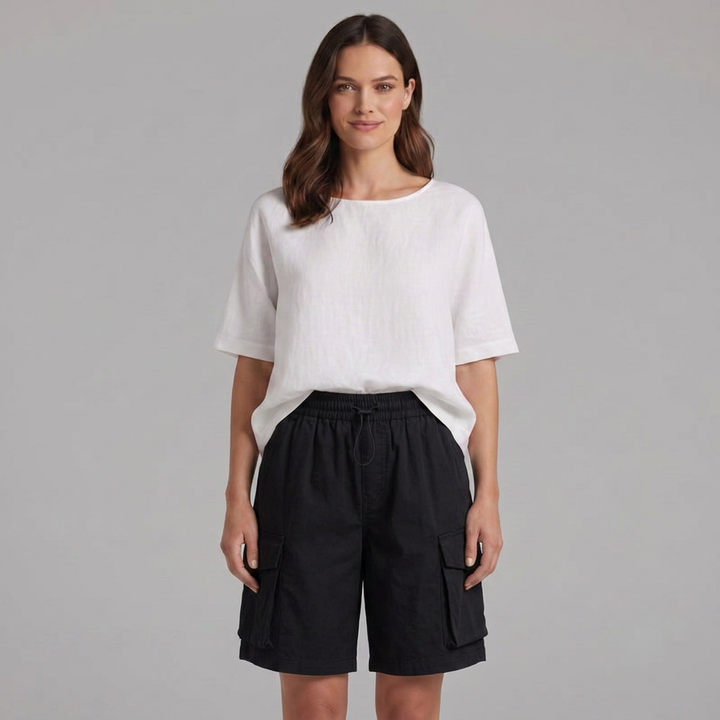 Casual women's knee-length cargo shorts with multiple utility pockets for everyday wear.