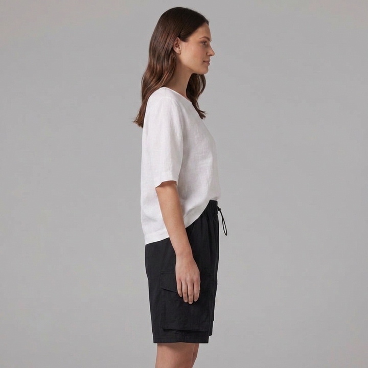 Comfortable women's Bermuda shorts for summer fashion, featuring a relaxed fit & handy pockets.