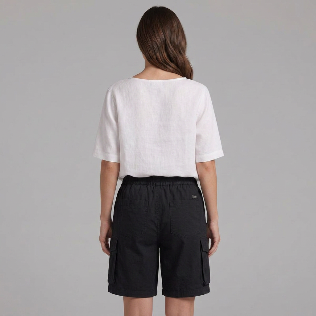 Stylish women's cargo shorts, knee-length & relaxed, perfect for casual summer outfits.