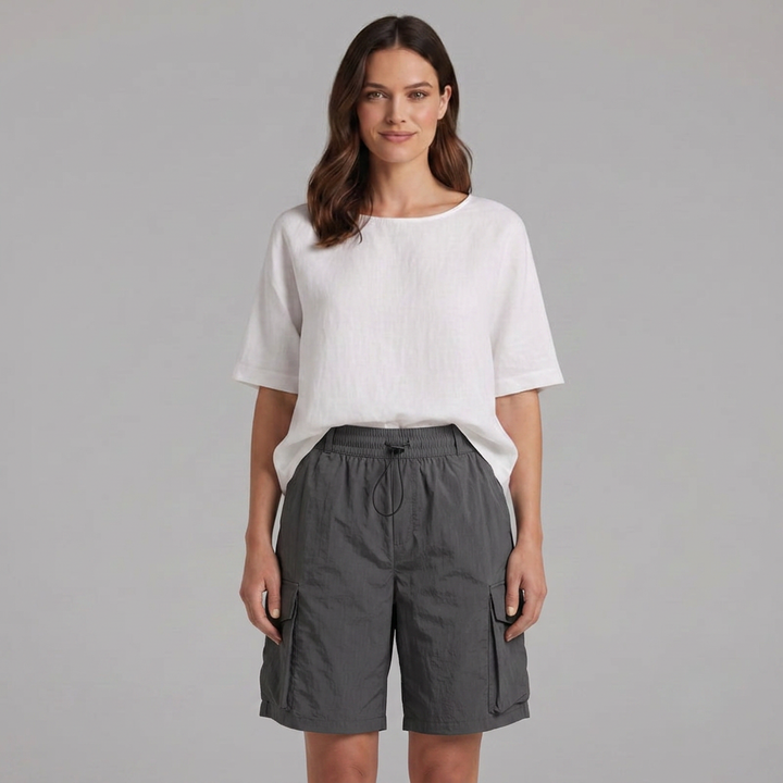Everyday women's relaxed cargo Bermuda shorts. Comfortable, knee-length, with useful pockets for summer.