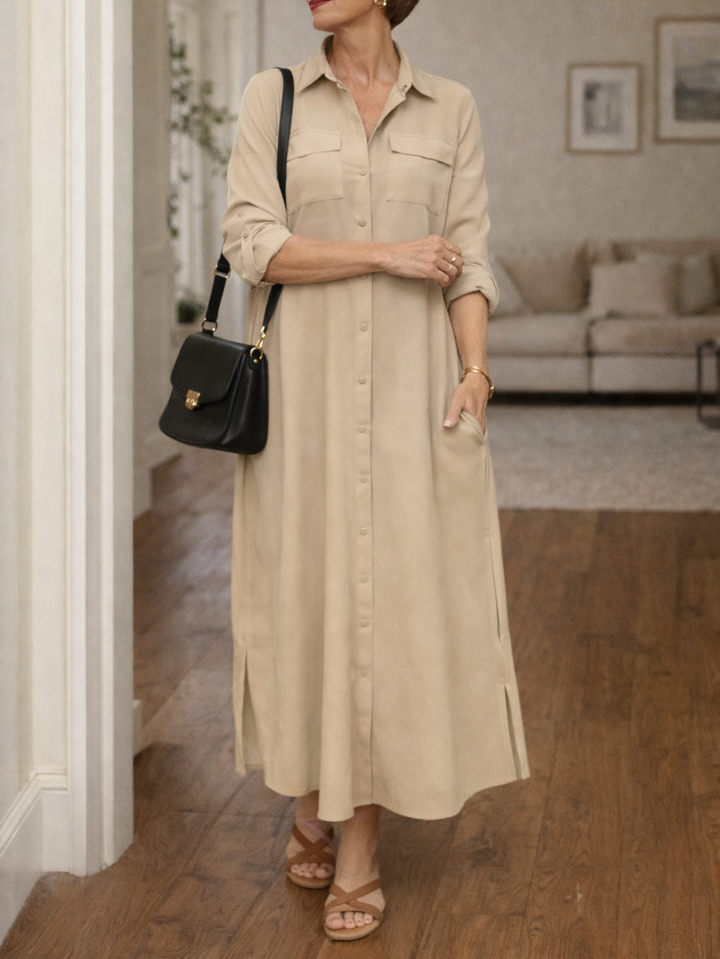 Close-up of the women's button front detail on a relaxed collared maxi dress. Versatile everyday shirt dress.