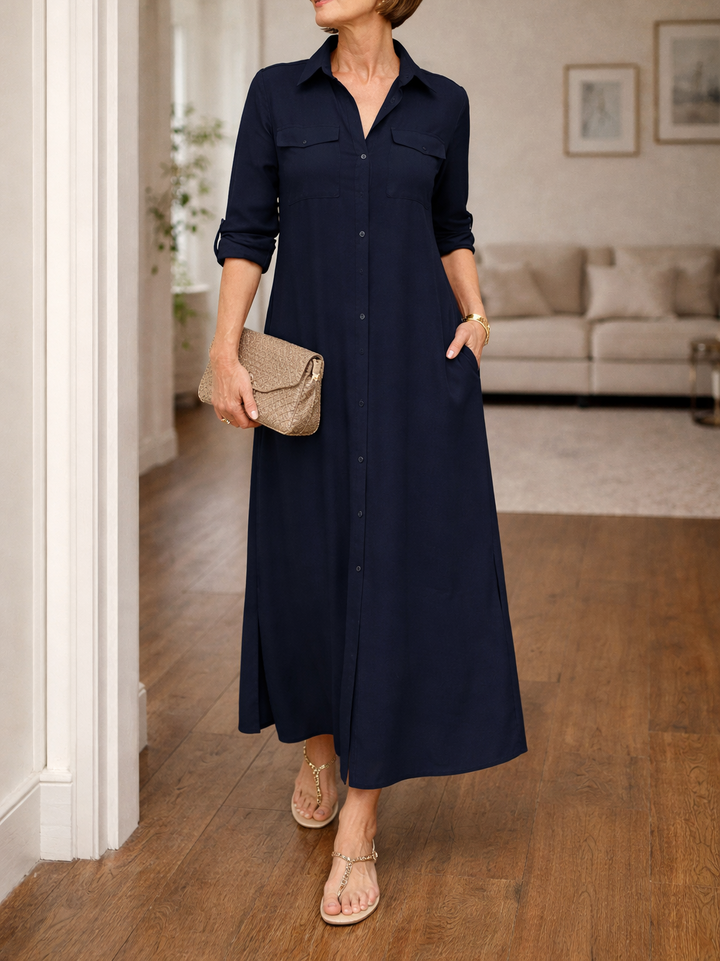 Full length shot of women's chic collared maxi dress. Button front, long sleeve, relaxed for all-season wear.