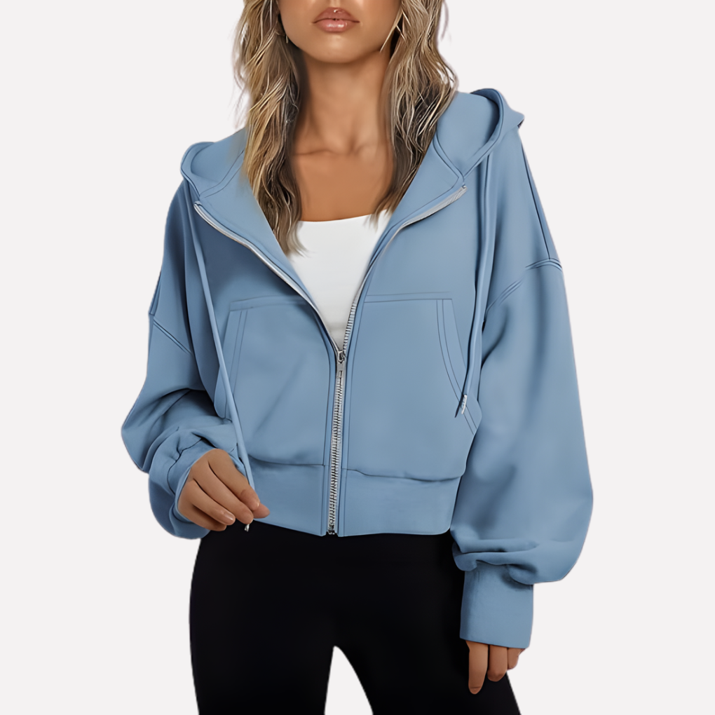 Comfortable women's cropped hoodie, relaxed fit, zip-up design, ideal for layering.