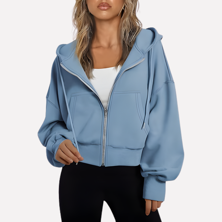 Comfortable women's cropped hoodie, relaxed fit, zip-up design, ideal for layering.