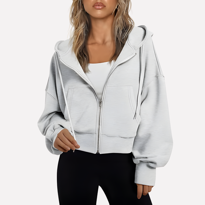 Everyday women's comfort wear: relaxed fit cropped zip hoodie with drawstring.
