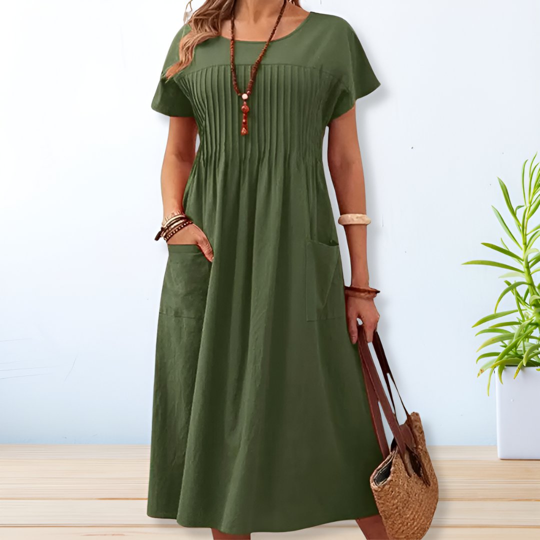 Women's relaxed fit day dress with tummy control, short sleeves & pockets. Ideal comfortable casual summer wear.