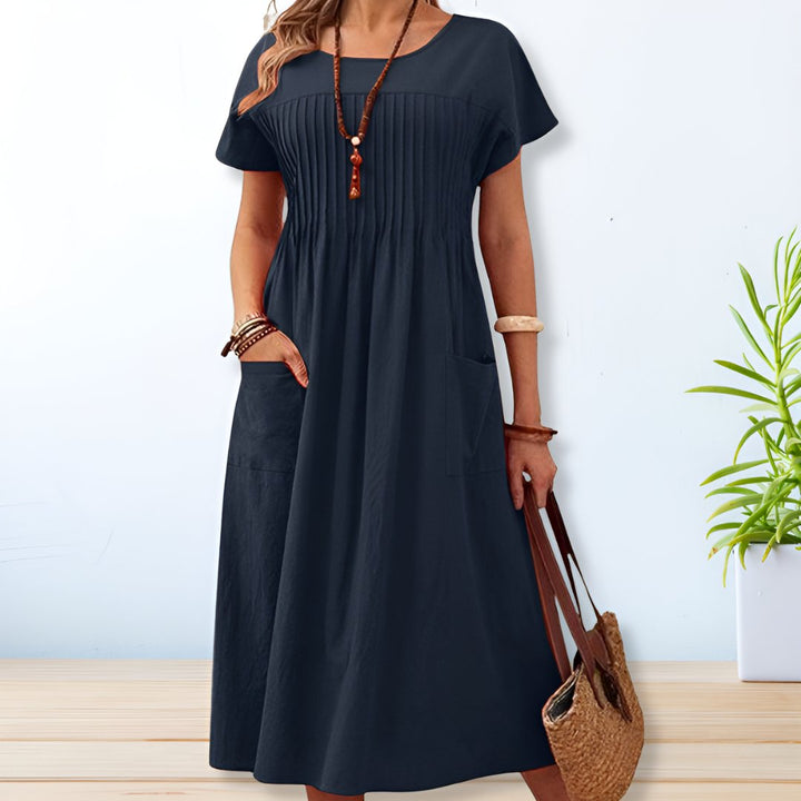 Orange short sleeve relaxed fit day dress for women, with tummy control and pockets, perfect for everyday summer style.