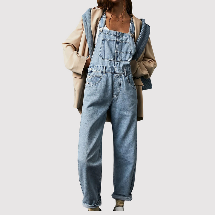 Women's relaxed-fit denim overalls in blue, offering effortless style & comfort for spring and summer casual wear.