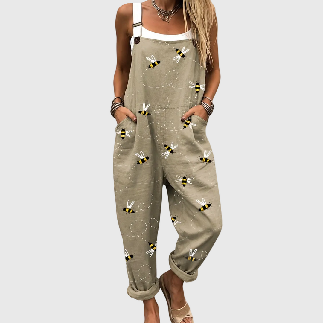 Women's relaxed fit denim overalls with decorative bee print, a comfortable casual summer jumpsuit featuring pockets.