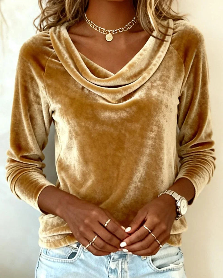 Chic women's top with a flattering drape neck, long sleeves, and a relaxed, comfortable fit for all-day wear.