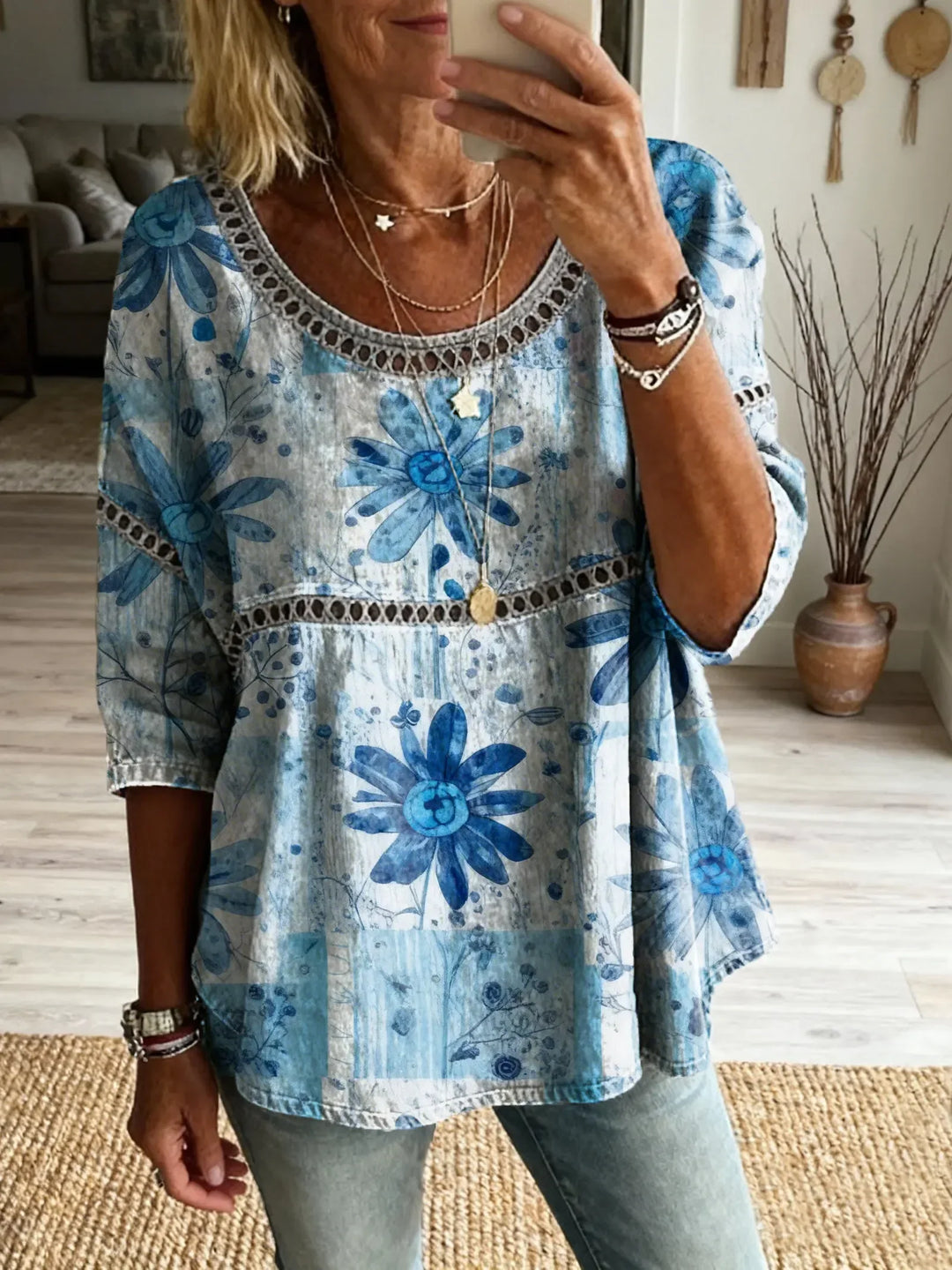 Versatile women's relaxed fit embroidered blouse. Effortless casual everyday top with three-quarter sleeves & round neck.