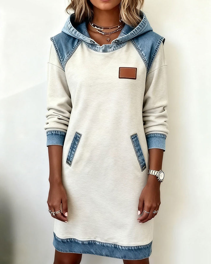Women's modern relaxed fit hooded dress for urban chic casual style. Long sleeve, versatile, everyday comfort.