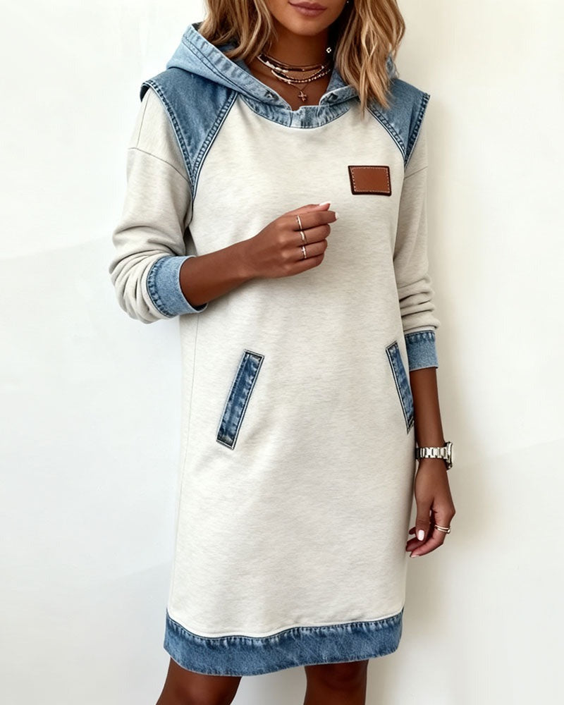 Comfortable women's hooded dress, relaxed fit. Modern long sleeve design for versatile casual fall/spring fashion.