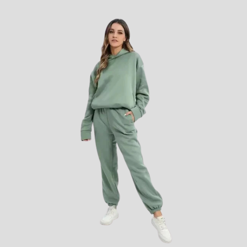 Women's relaxed fit hoodie & jogger set. Soft winter loungewear, a comfortable two-piece outfit for cozy days.