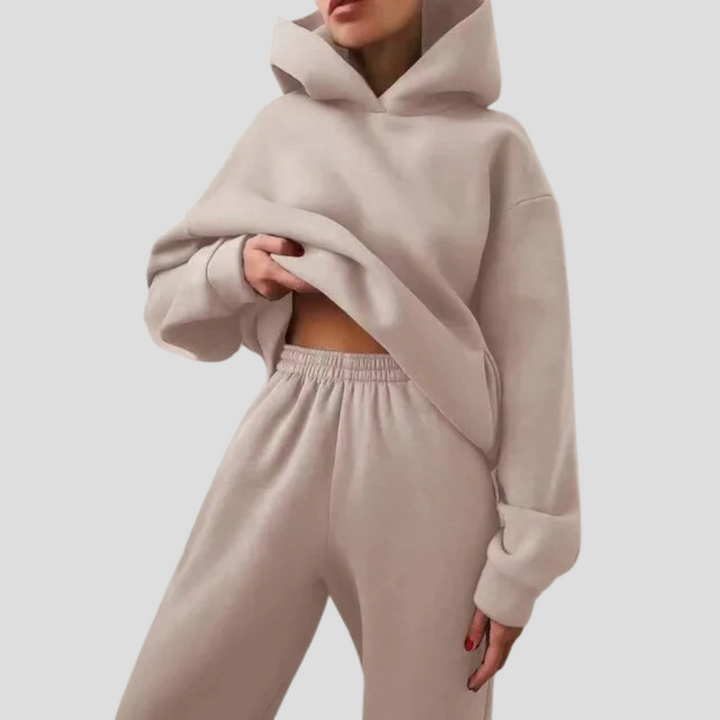 Comfortable women's hoodie and jogger set. Relaxed fit winter loungewear, perfect for cozy casual style.