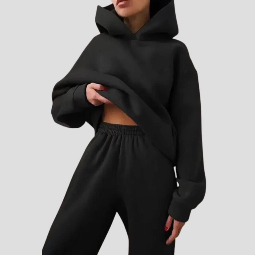 Soft women's two-piece hoodie and jogger set, perfect relaxed fit winter loungewear for ultimate comfort.