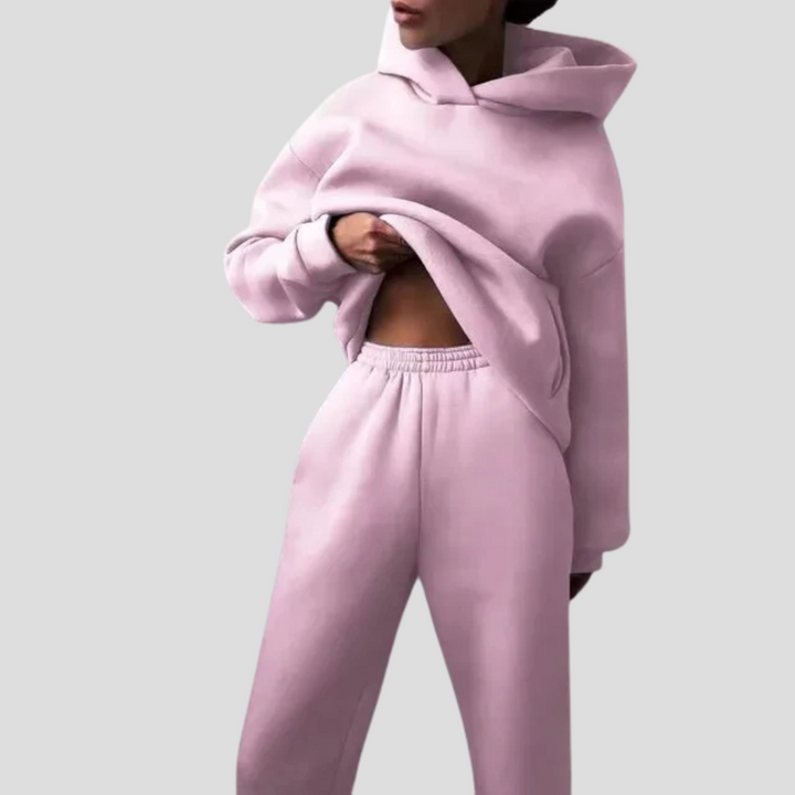 Women's hooded tracksuit, a cozy jogger and hoodie set for relaxed winter loungewear and casual fashion.