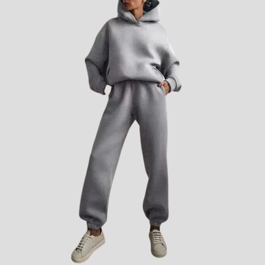 New women's relaxed fit hoodie and jogger set. Cozy winter loungewear, a perfect two-piece casual outfit.