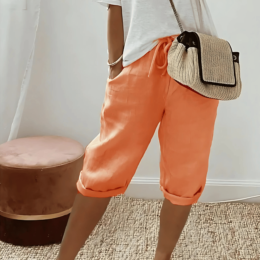 Women's relaxed fit knee-length harem shorts, perfect for comfortable casual wear & summer style.