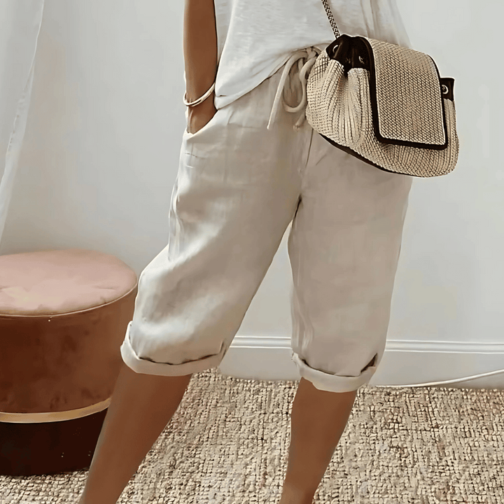 Effortless women's relaxed fit knee-length shorts, comfortable for casual summer fashion & everyday style.
