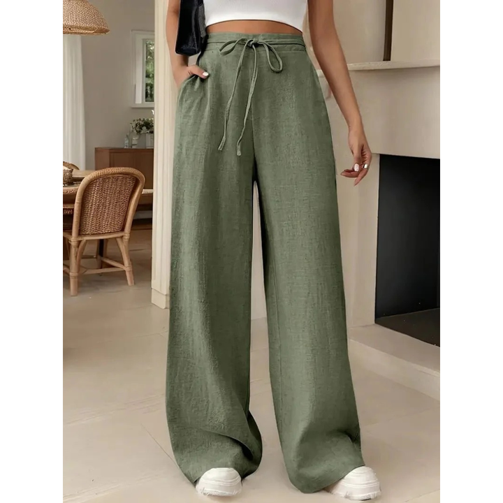 Women's relaxed fit linen wide leg trousers. Comfortable & chic for casual summer style.