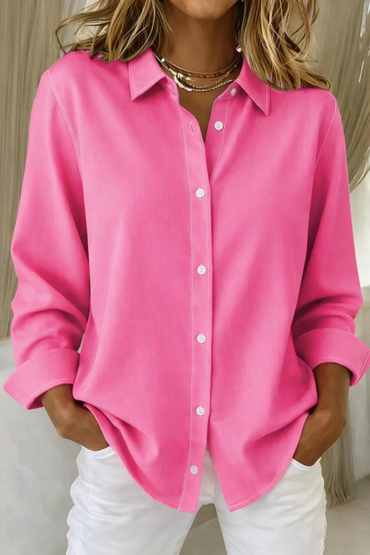 Chic women's long sleeve button-down shirt with a relaxed fit, ideal for office or casual wear.