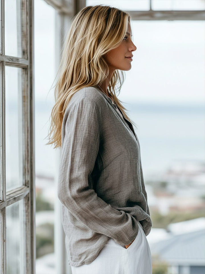 Versatile women's long sleeve Henley top, classic style for everyday casual fashion.