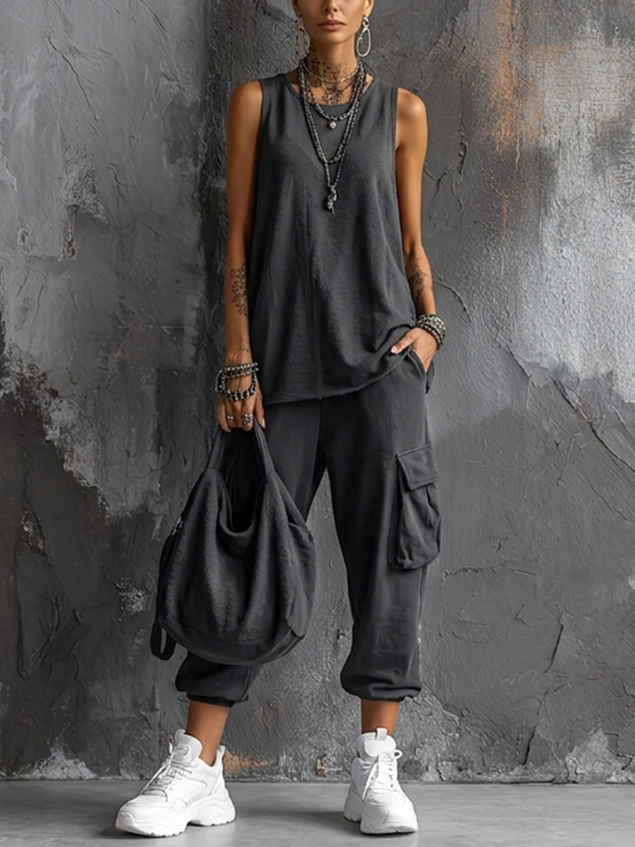 Women's relaxed fit loungewear set featuring a comfortable tank top & stylish cargo trousers. Ideal for casual wear.