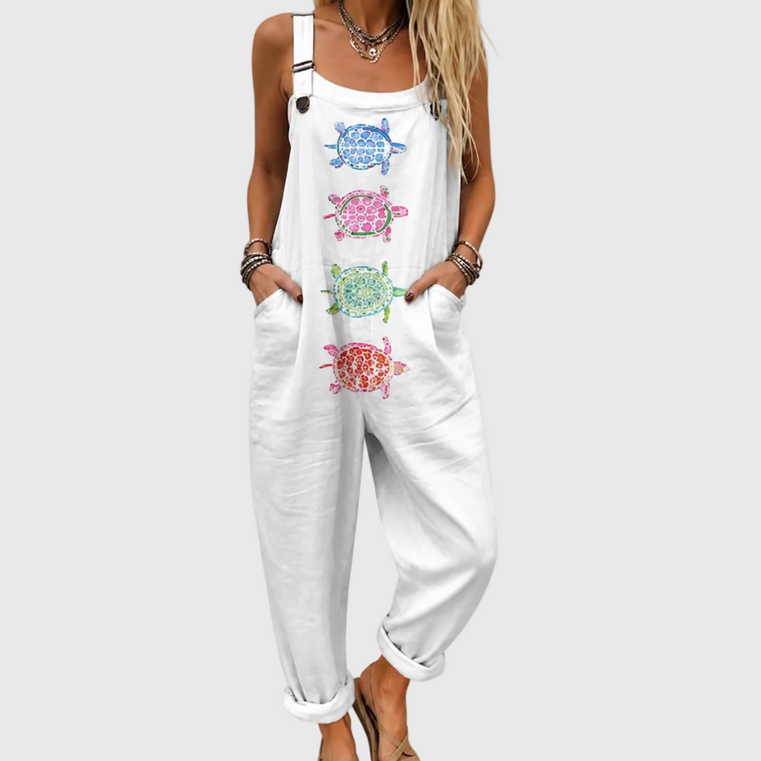 Women's relaxed fit marine turtle print jumpsuit. Sleeveless, comfortable one-piece, perfect for summer beachwear.