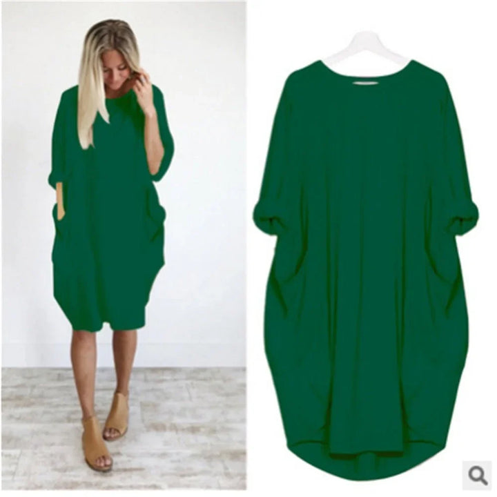 Easy-to-wear relaxed fit women's midi dress, 3/4 sleeves & pockets, great for versatile casual outfits.