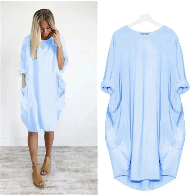 Plus size friendly relaxed fit midi dress for women, with comfortable 3/4 sleeves & convenient pockets.