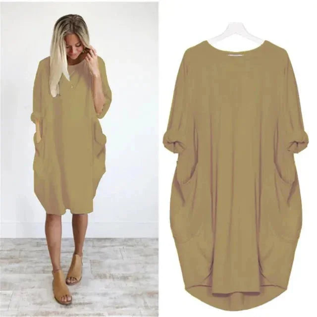 Comfortable women's relaxed fit midi dress, perfect for casual wear, featuring 3/4 sleeves & pockets.